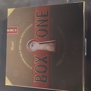Box One Mystery Game by - Black and Red